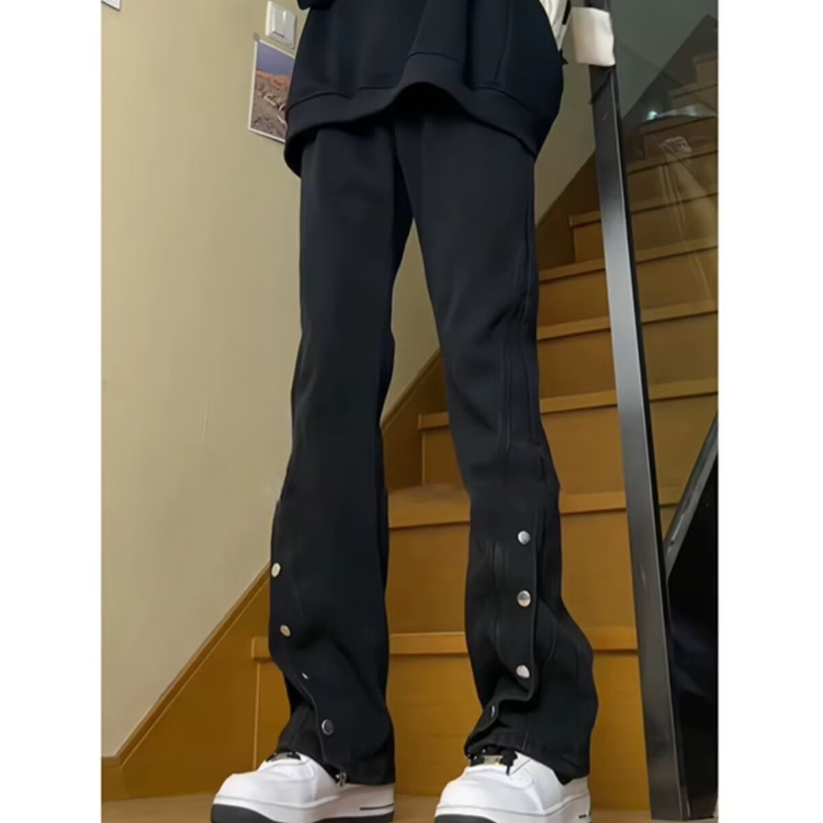 Jeans negros de estilo americano de hebilla de tendencia de otoño y invierno nuevos pantalones de hip-hop casuales de nicho de micro bocina