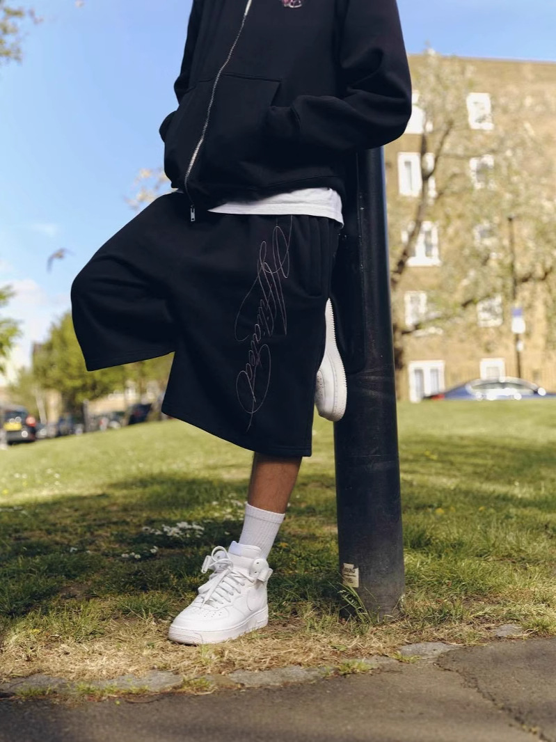 American Retro Europa y Estados Unidos Calle transfronteriza hip-hop verano bordado pantalones cortos sueltos casuales de moda pantalones cortos hombres