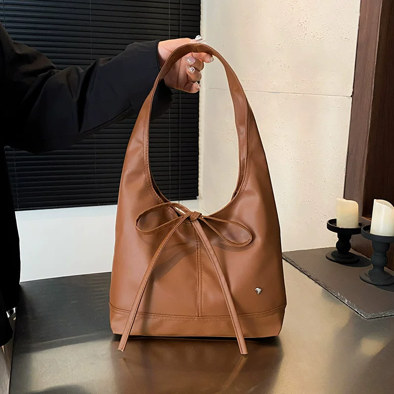 Small design universal capacious one-shoulder bag for leisure with bow, shoulder bag