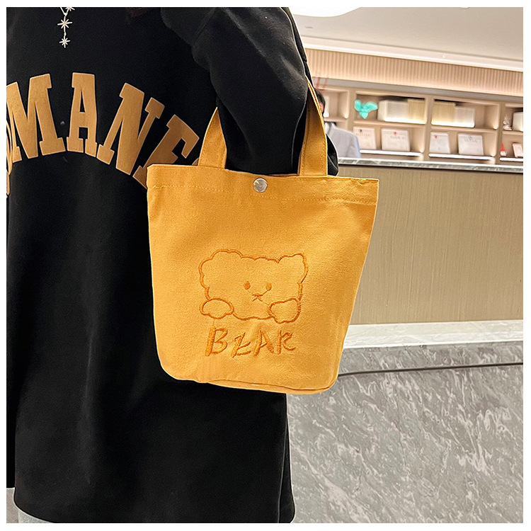 Personalized ladies' bucket bag, versatile and cute canvas bear wholesale, simple Japanese style new handbag undefined