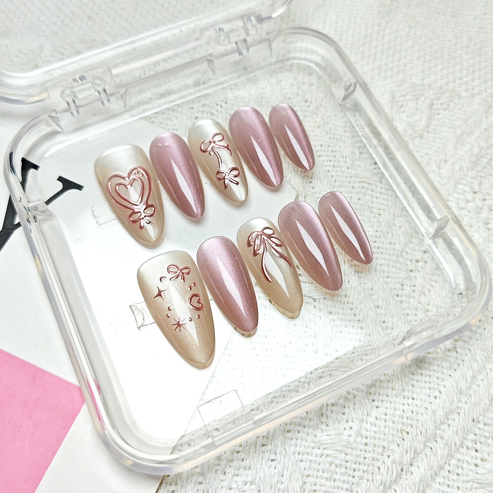 Love Cat Eye Bowknot Wear Armor 10 piezas de estrellas de código dividido uñas hechas a mano Parche de uñas en forma de almendra tridimensional