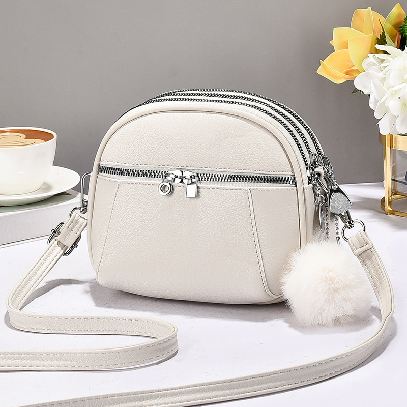 Versión coreana de varios compartimentos de alta calidad para damas bolso cuadrado pequeño bolso de hombro de moda de verano 2025 nuevo bolso de mensajero de todo fósforo