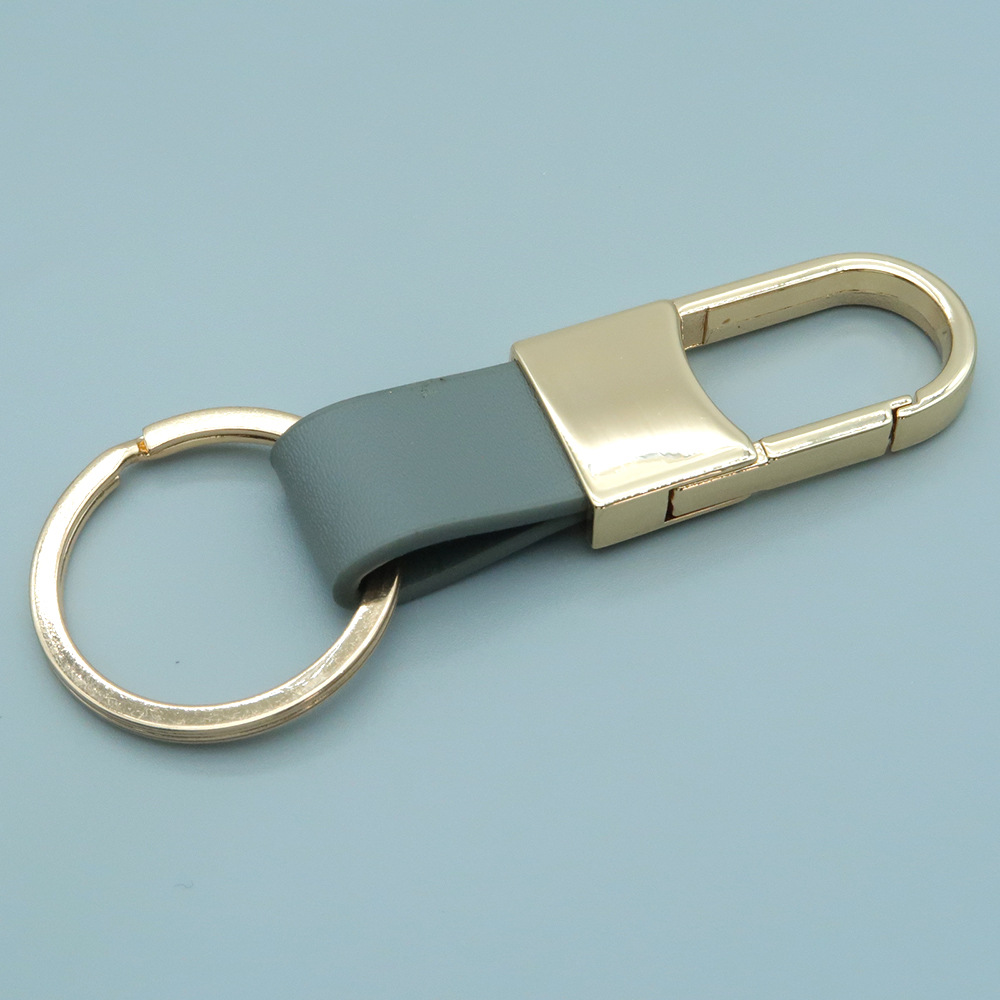 Venta directa de fábrica de llaveros de coche de metal y cuero genuino con logotipo grabado con láser, llaveros creativos. image 11
