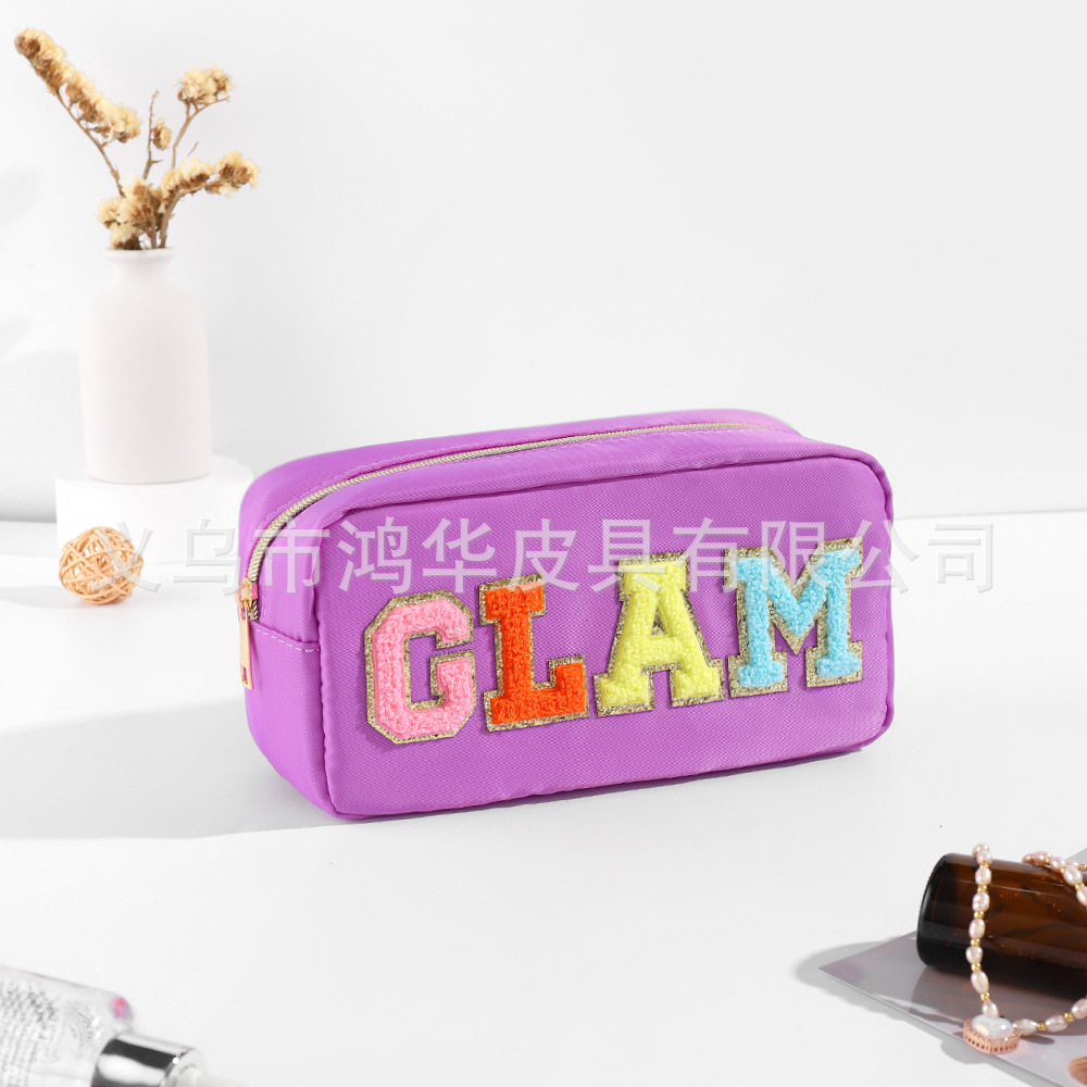 Transfronterizo amazon popular toalla bordada carta de nylon bolsa de cosméticos bolsa de almacenamiento de gran capacidad informal de las mujeres a prueba de agua