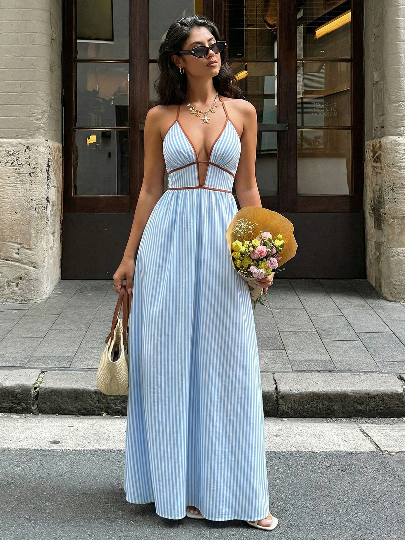 2026 verano nuevo vestido de vacaciones de rayas de cuello en V profundo tiktok ventas calientes sin mangas vestido de cuello largo