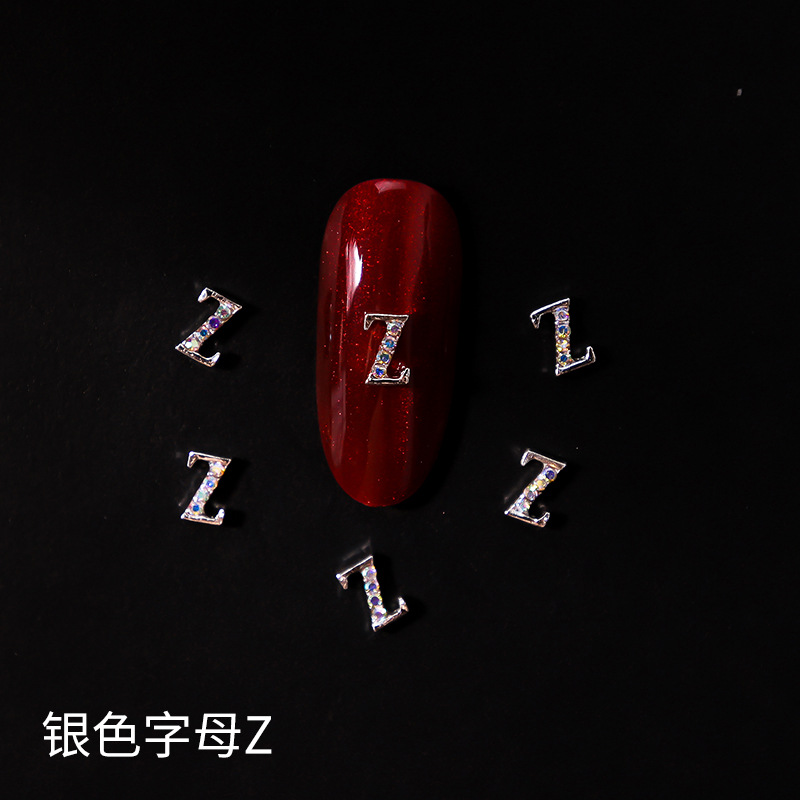 Nueva LZ manicura 26 letras aleación joyería estilo japonés Internet celebridad plata letras manicura joyería clavo Taladro