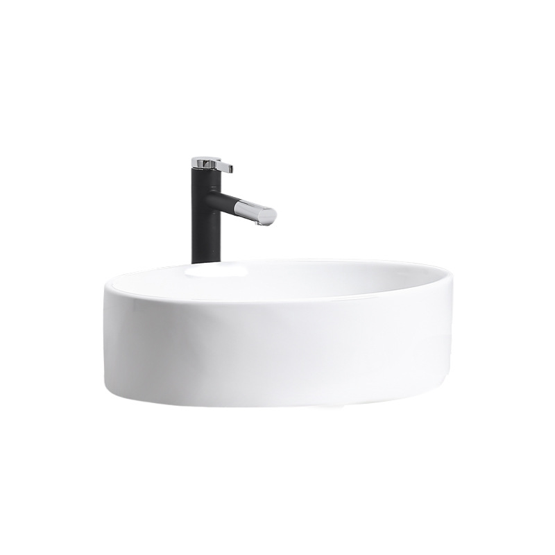 lavabo de cerámica simple elíptico en la mesa de arte lavabo pequeño tipo de lavabo fábrica de lavabo único al por mayor image 5