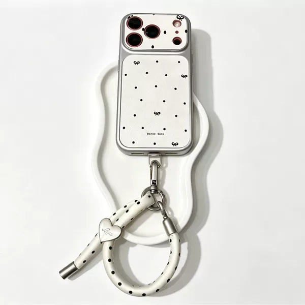 Exquisite phone chain, featuring a fabric leopard print and polka dot design, with a heart-shaped keychain and a bag charm