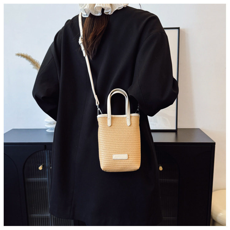 Summer straw woven beach bag 2025 New style seaside vacation handbag, simple and versatile bucket bag, woven crossbody bag undefined