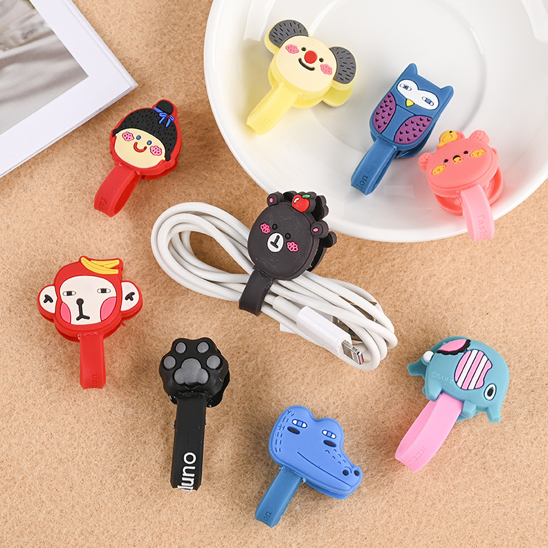 供应创意卡通按扣绕线器 数据线理线器 PVC创意耳机线理线器