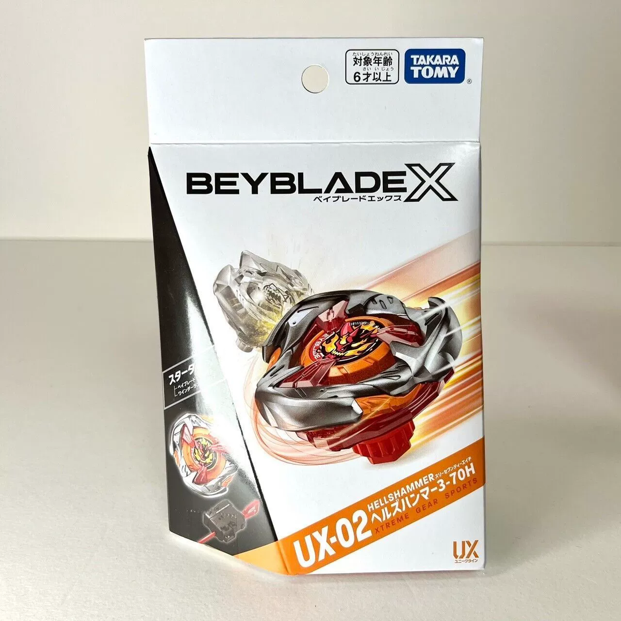 Юла (Takara Tomy) UX02 — бойцовая игрушка в стиле бейблейд, одиночная упаковка