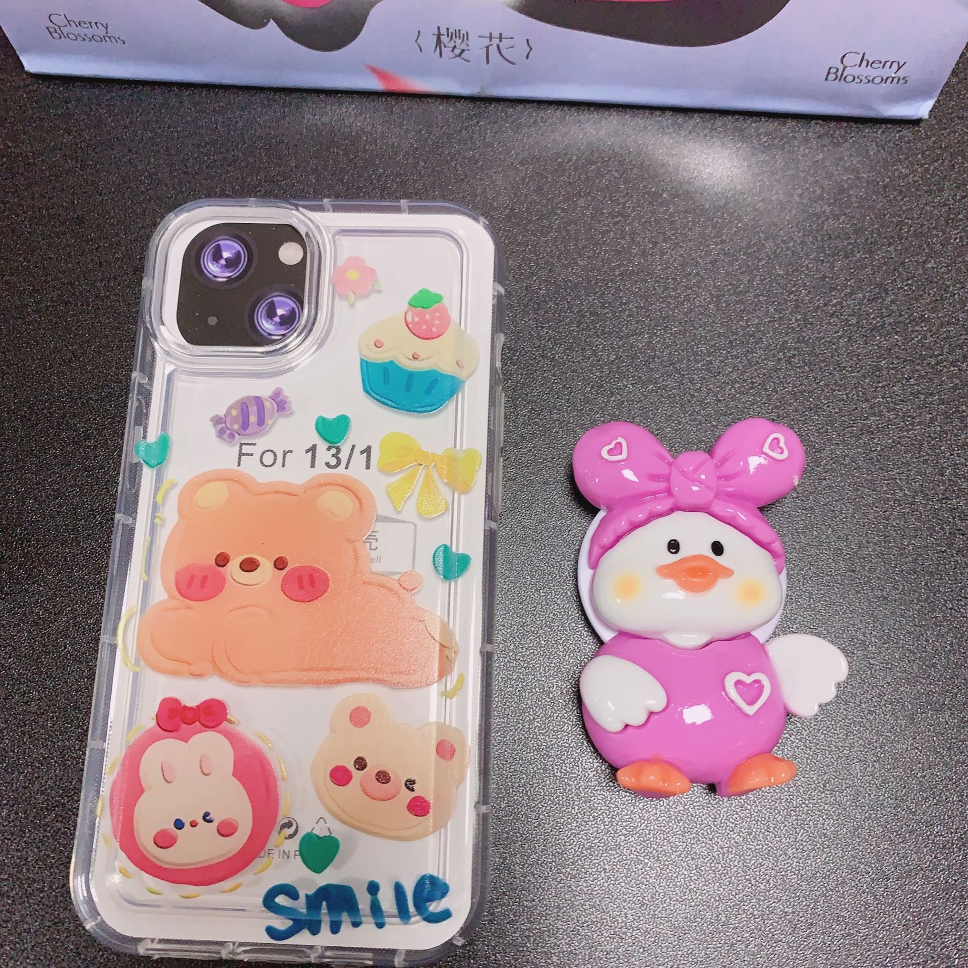 Dibujos animados Yugui perro soporte creativo perezoso airbag telescópico Lollipop soporte epoxi teléfono móvil soporte de escritorio