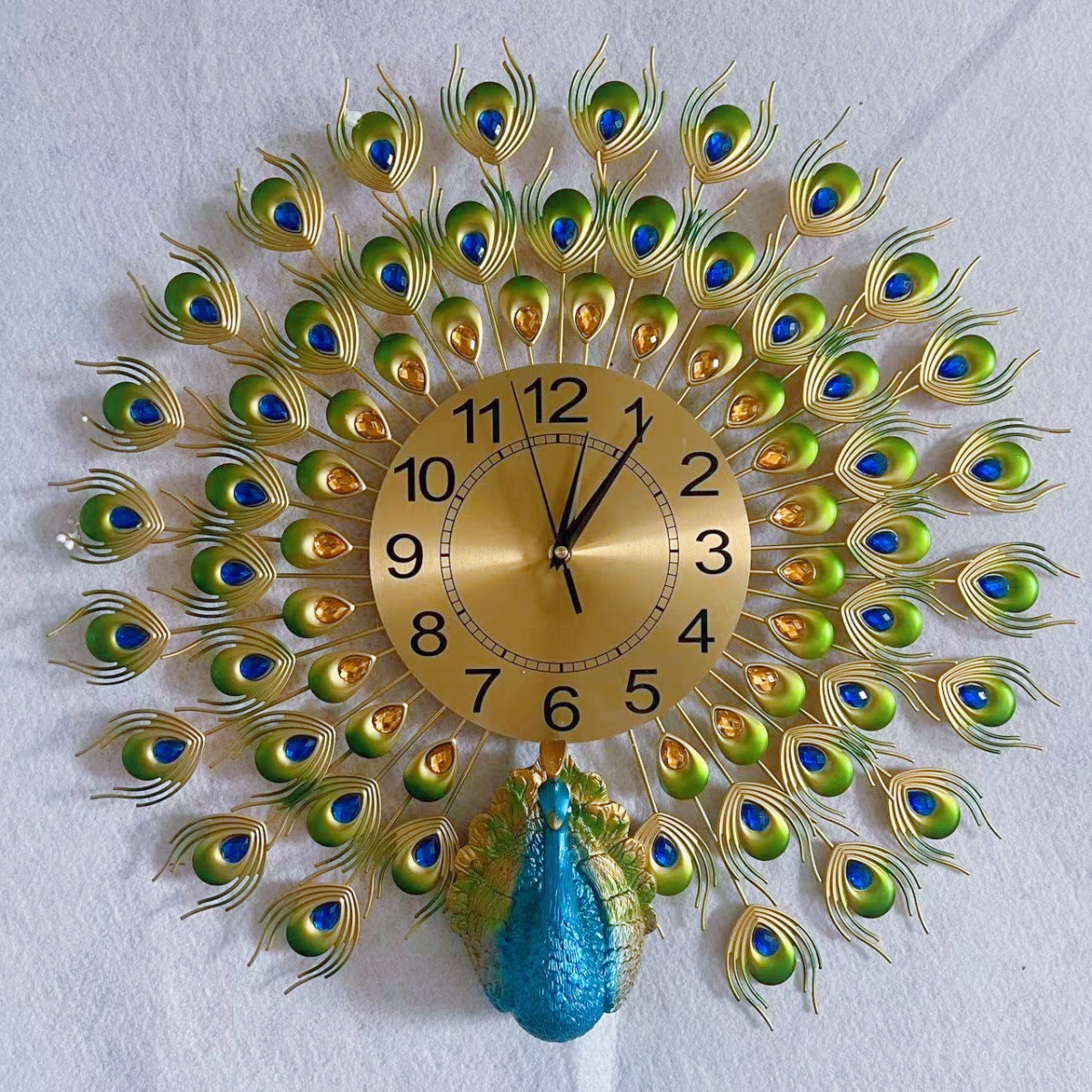 Venta directa de fábrica Reloj de pared de pavo real Sala de estar Reloj creativo de moda para el hogar Reloj europeo de decoración simple y silencioso