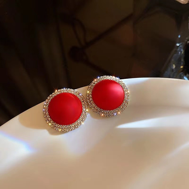 red earrings from pearl