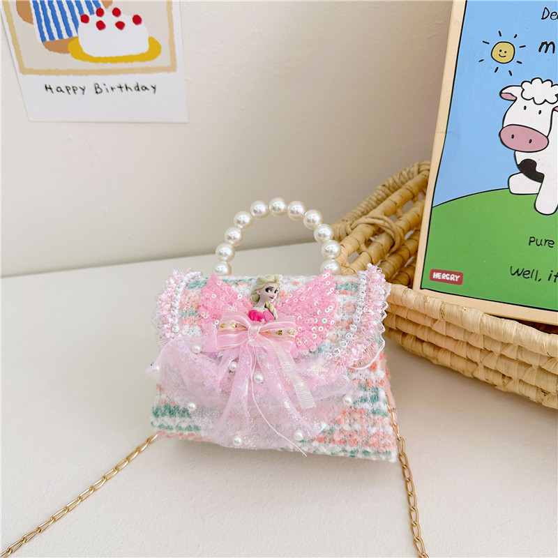 Nuevo bolso infantil, bolso de moda, bolso de princesa, bolso de niña encantador, bolso de mochila para bebés en línea, popularidad