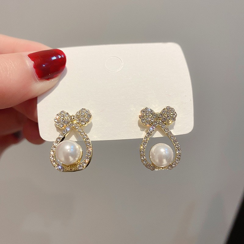 1 Pair Casual Elegant Lady Geometric Bow Knot Inlay Imitation Pearl Zircon Drop Earrings display picture 5