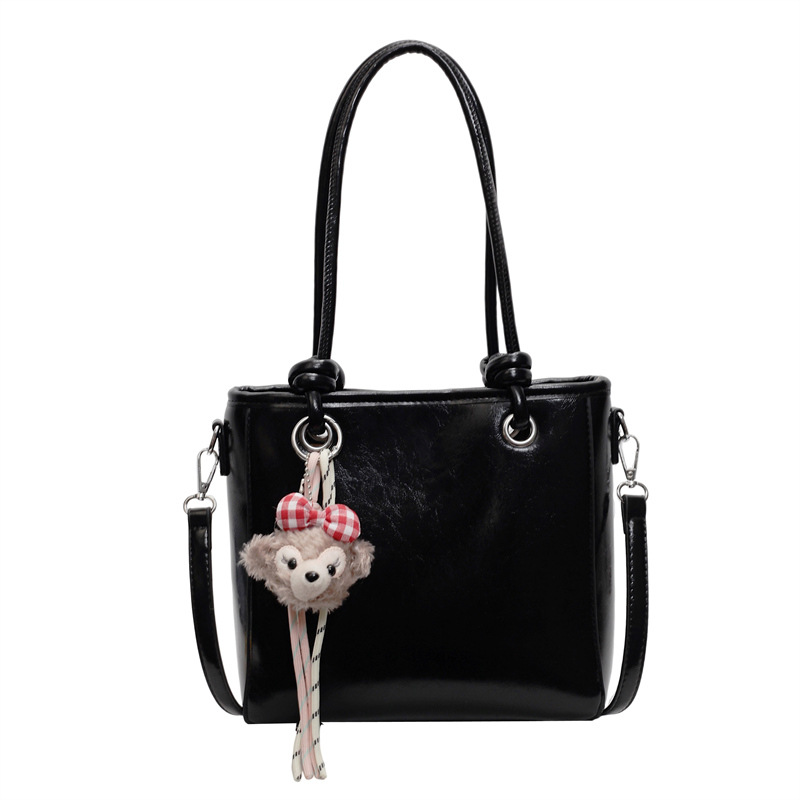 Bolso de hombro universal super caliente para mujeres 2025, nuevo diseño de moda, bolso de mano de alta calidad, bolso de cubo de agua.