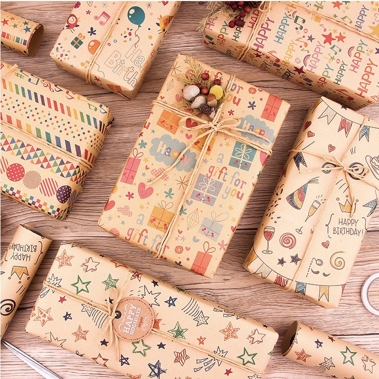 Transfronterizo nuevo feliz cumpleaños papel de embalaje de papel Kraft lindo libro de dibujos animados papel de regalo en stock al por mayor