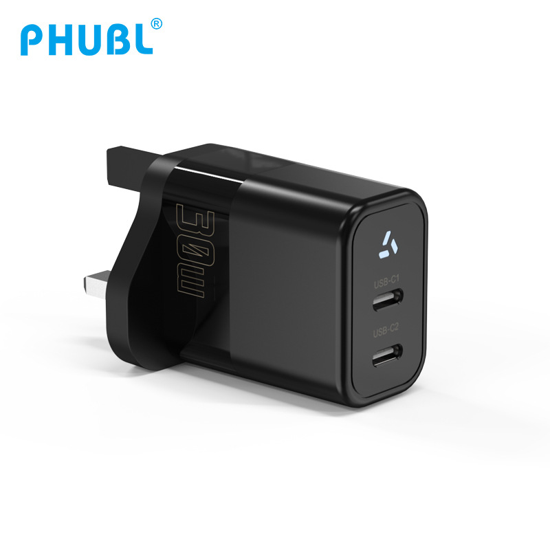 El cargador UKCA del nitruro de galio PD30w certificó el adaptador de carga rápido principal de carga del cuaderno del puerto dual del teléfono móvil del estándar británico