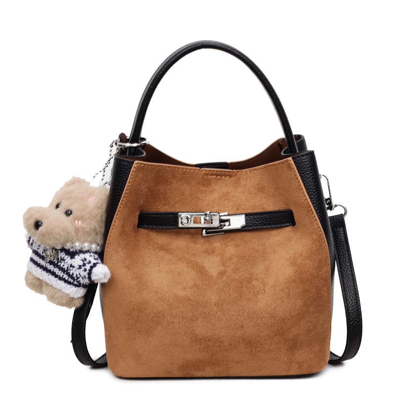 Bolso de venta caliente, bolso de mochila para mujeres 2025, nuevo nicho coreano de alto nivel, bolso de cubo de mano de empalme