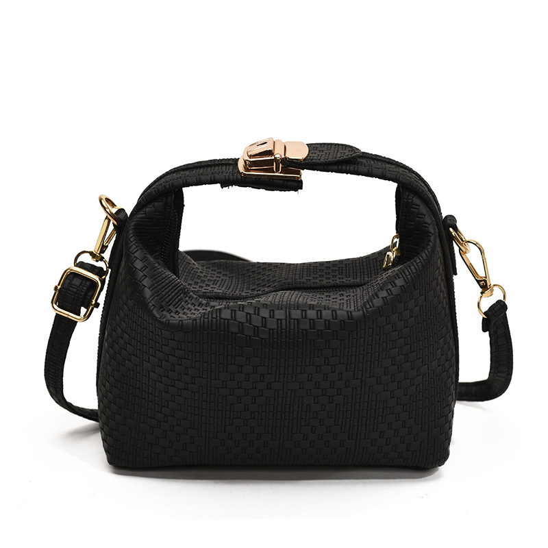 Bolsa de mano a rayas de moda coreana para mujeres otoño / invierno 2024 nuevo estilo simple bolso de hombro personalizado gran capacidad mochila