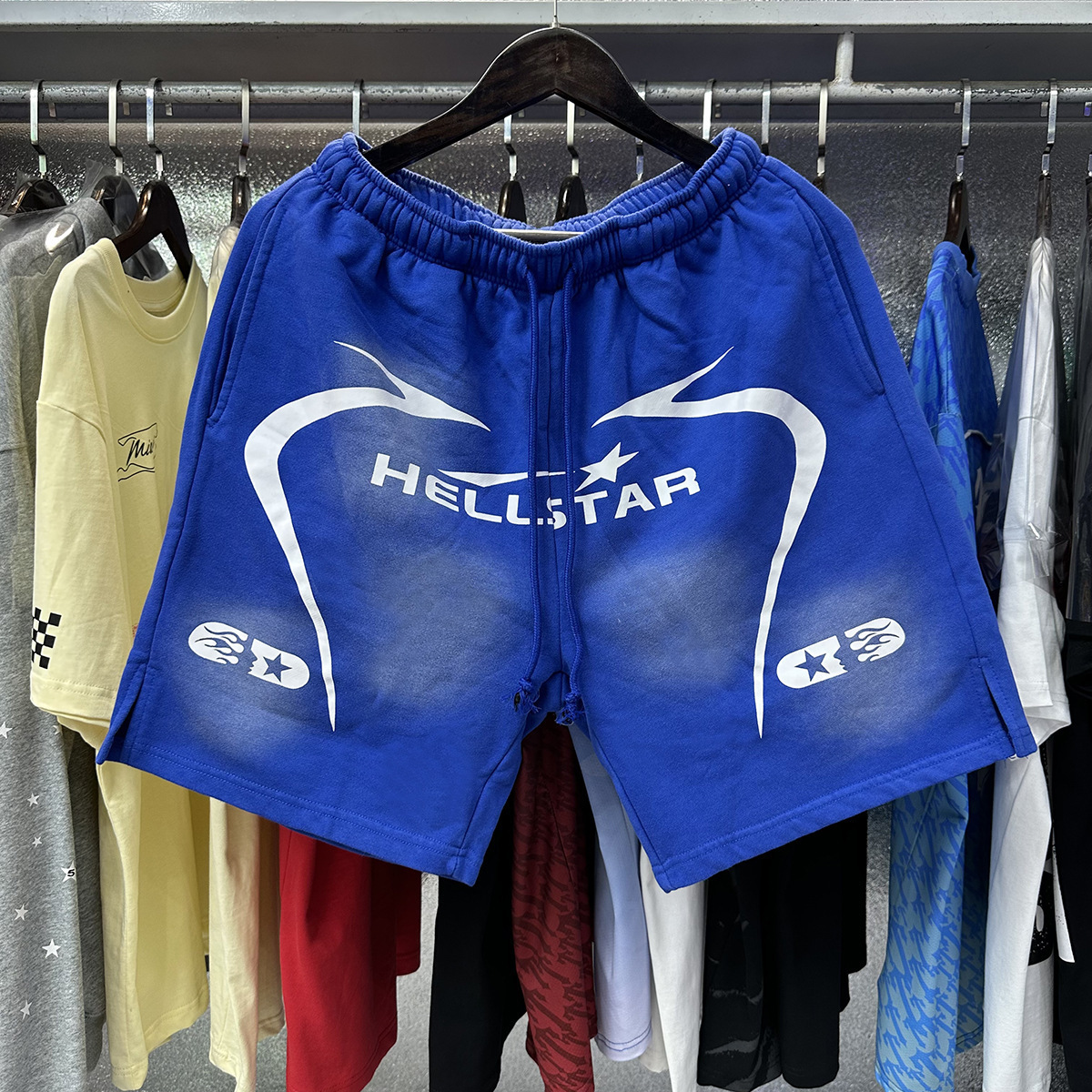 Hell Star lavando y desgastando pantalones cortos casuales 2024 verano nuevo estilo marca de moda europea y americana hip-hop pantalones de cinco puntos hombres y mujeres