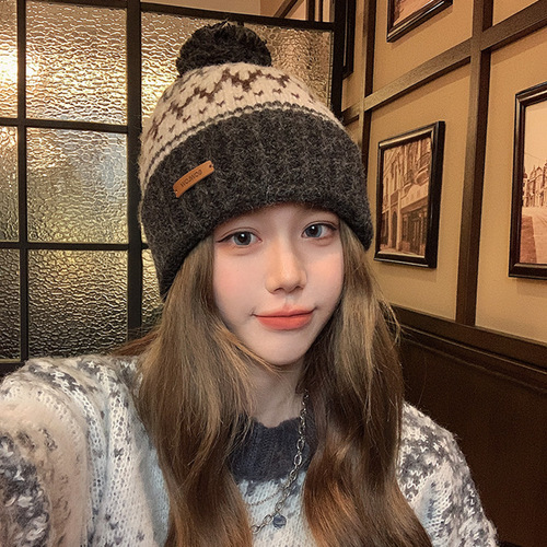 2024 new jacquard wool hat for women in autumn and winter ear protection, warm cold hat, cute hair ball knitted hat, big head circumference