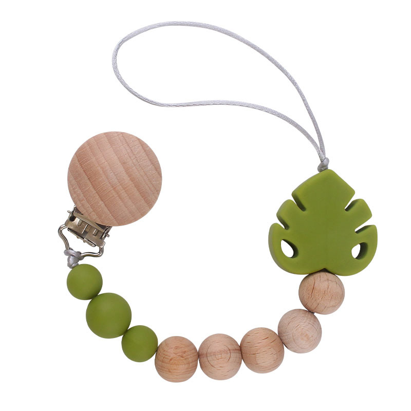 Suministros para bebés creativo haya chupete clip molar juguete mordedor bebé hoja de silicona chupete cadena anti-caída de la cadena