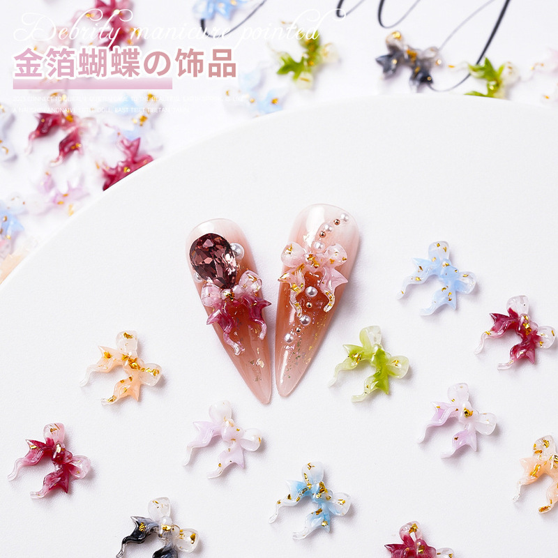 Net red butterfly nail art jewelry wholesale gradient nail art accessories fairy three-dimensional gold foil bow resin nail drill