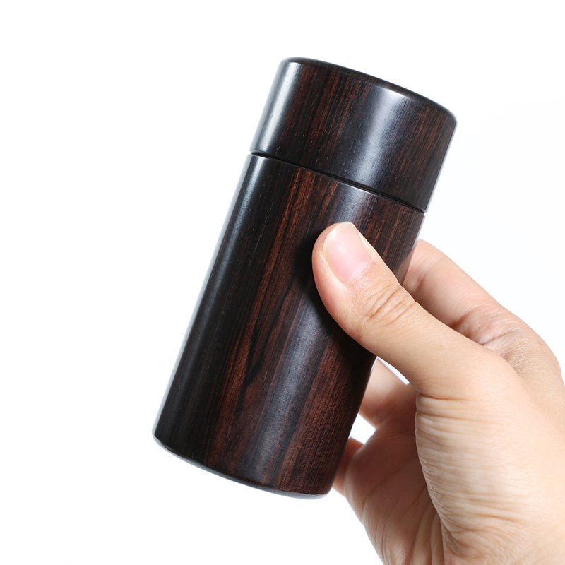 紫光檀は木を整えて大きいサイズのお茶の缶を掘って旅行します。|undefined