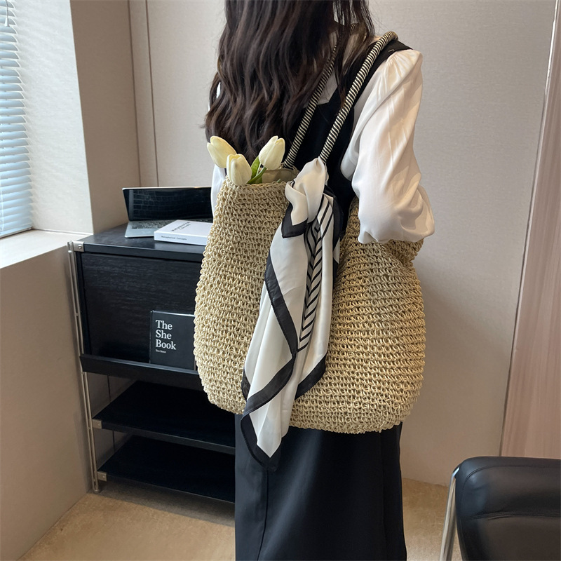 Bolsos de paja populares de verano para mujer 2025 nuevo bolso de tote hueco tejido más vendido bolso de mujer de viaje de gran capacidad