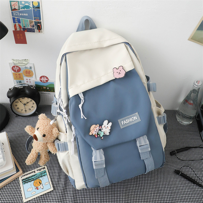 Colores contrastantes universales estudiantes japoneses mochila escolar de gran capacidad universitaria mochila de ocio de viento herramientas mochila de hombro al por mayor