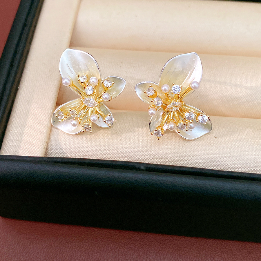 Agujas de plata, mariposas de piedra, flores, perlas geométricas, temperamento, personalidad, pendientes diarios, auriculares de lujo ligero y de alta calidad. image 9