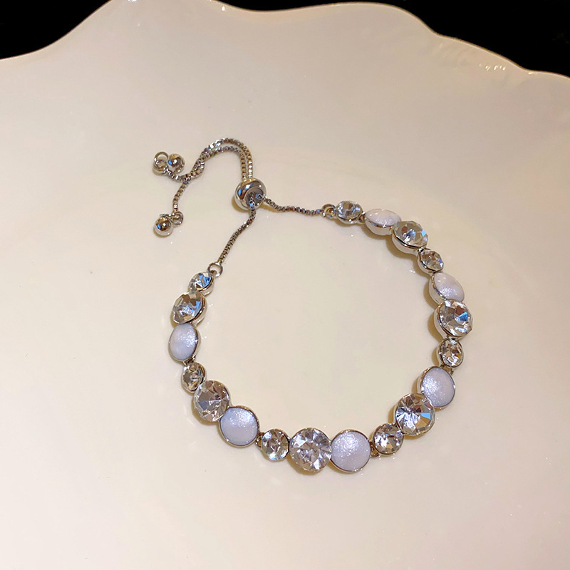 Pulsera de amor solar de circón galvanizado en oro real