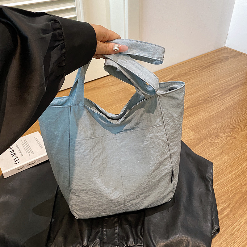Casual japonés nylon impermeable ocio color sólido simple de gran capacidad para estudiantes de clase de viaje de hombro mochila