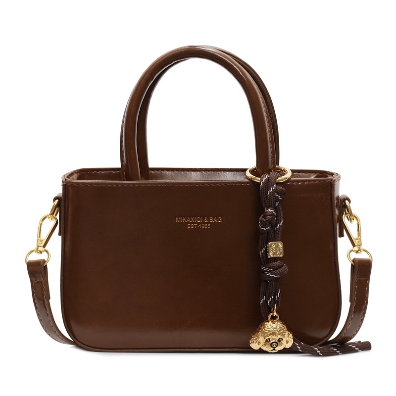 Transfronterizo simple bolso de mano ocio para mujeres 2025 nuevo bolso de hombro de moda retro popular bolso de mochila versátil