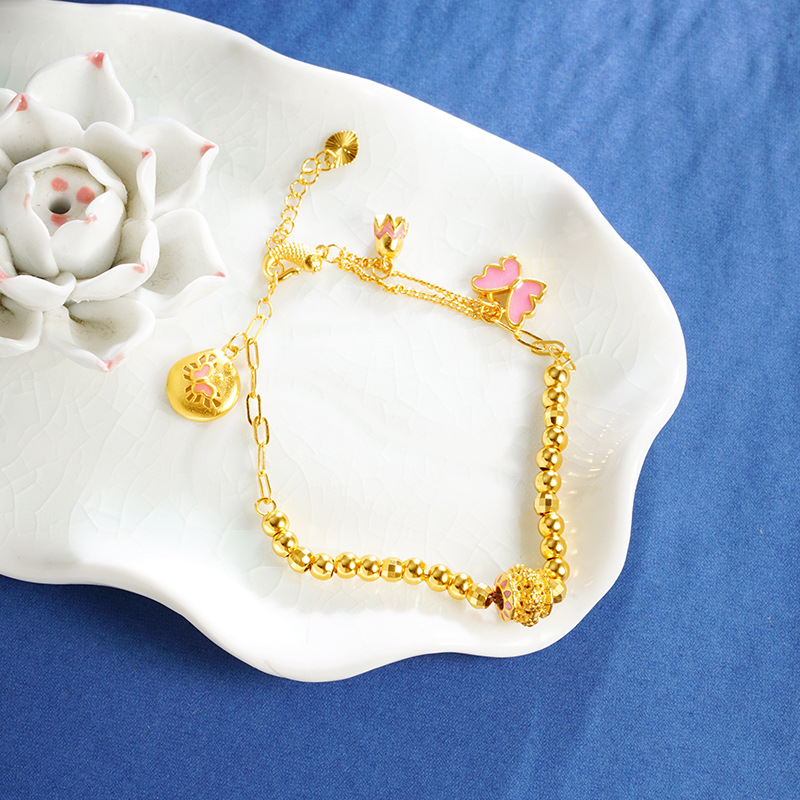 Nuevo oro de arena vietnamita mariposa goteo de aceite láser cuentas Bungee pulsera de cuentas versátil no se desvanece el suministro de joyas retro