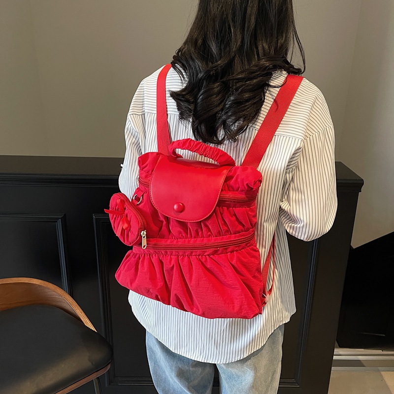 Mochila transfronteriza 2025, nueva moda coreana dulce bolso de mano plegable estilo campus bolso de escuela secundaria