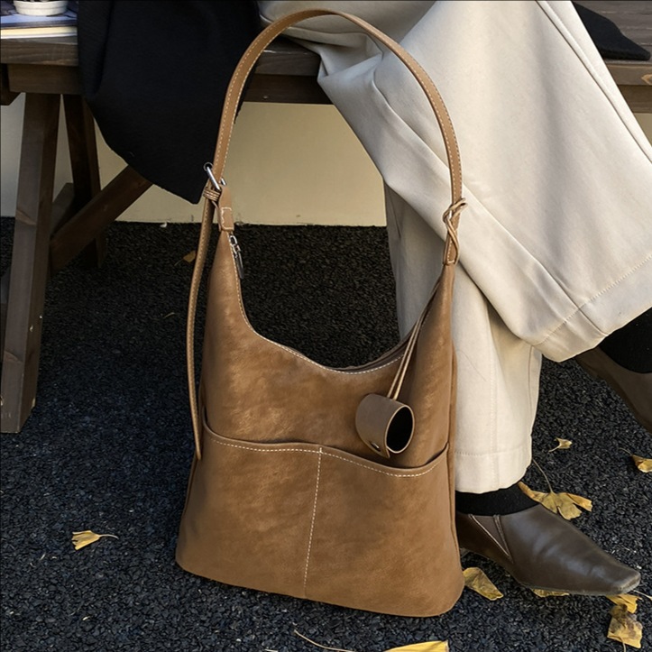 Cross-border backpack, bolsas de mano, bolsas de cubo, bolsas de gran capacidad, bolsas de hombro casuales para mujeres.