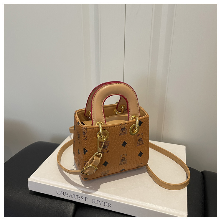2026 nuevo bolso infantil caricatura lindo oso impresión bolso de hombro de moda mini bolso de bebé