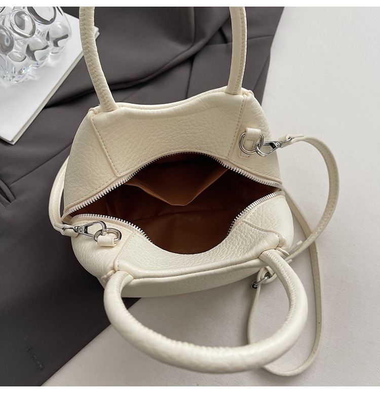 This is a unique, stylish and casual women's bucket bag for the summer of 2025. It's a Korean style single-shoulder crossbody women's bag with a sense of fashion undefined