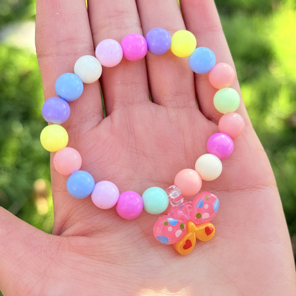 Pulseras infantiles coloridas con cuentas y varios colgantes de dibujos animados, accesorios de alta calidad y exquisitos para niñas, regalos de cumpleaños, productos al por mayor.