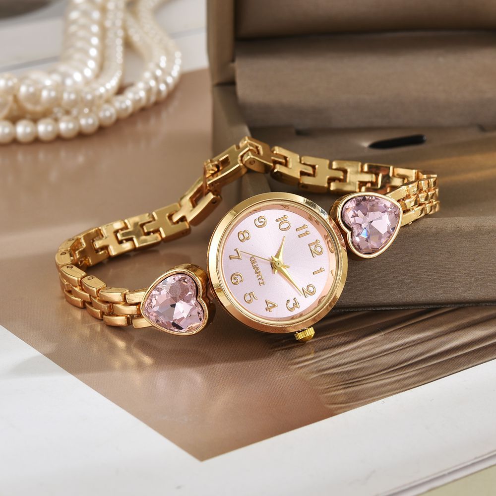 AliExpress nuevo reloj de lujo simple esfera digital redonda femenina temperamento de moda amor pulsera pequeña reloj de mujer