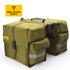 自転車の荷物は両側の後ろの荷物を包んで防水します。