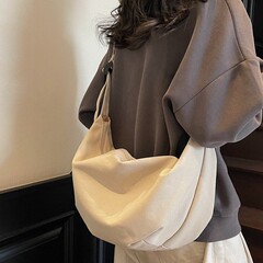 キャンバスバッグ レディース 大容量 2025 新作 夏 万能 レイジースタイル シングルショルダー クロスボディバッグ カジュアル 通勤 餃子バッグ