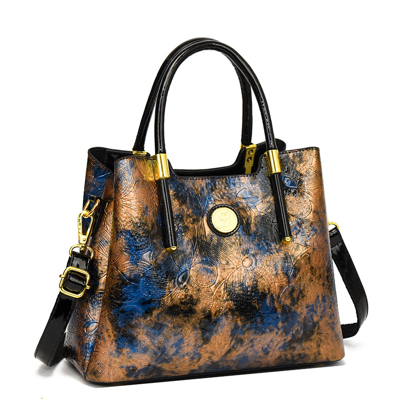 Bolsa pequeña para mujeres 2024 nueva moda de cuero suave de color sólido bolso de madres de mediana edad temperamento simple bolso casual versátil