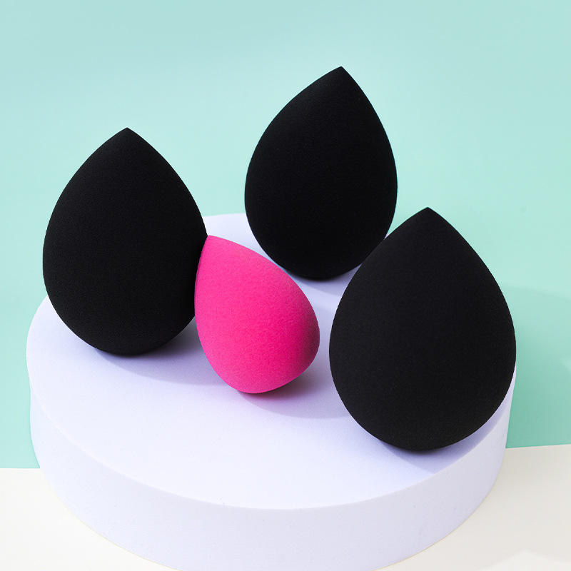 Fábrica personalizada gota de agua gigante polvo de huevo de maquillaje no puede comer polvo de maquillaje húmedo y seco de doble uso esponja de maquillaje huevo de maquillaje
