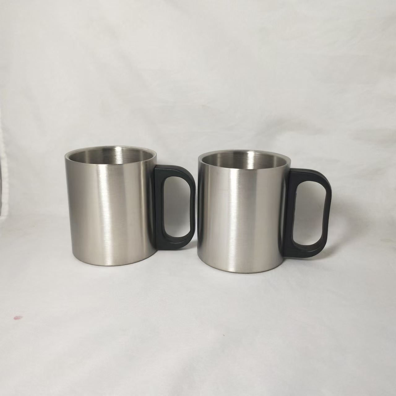 Nuevo termo de acero inoxidable de venta caliente con mango, taza de agua doméstica portátil, fabricante de tazas de oficina de negocios de moda