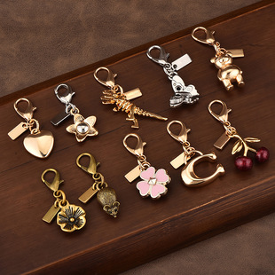 Car key pendant high sense bag accessories gold color bear cherry four-leaf clover butterfly schoolbag jewelry wholesale