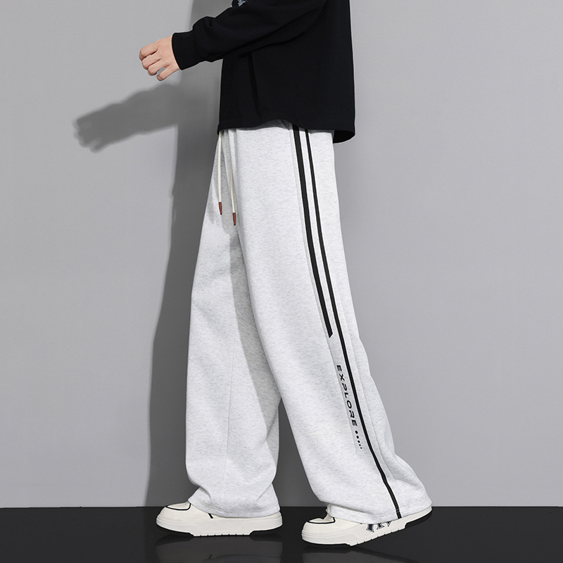 Marca de moda de otoño pantalones de impresión para hombres pantalones casuales para hombres, pantalones de primavera y otoño holgados para el aire libre